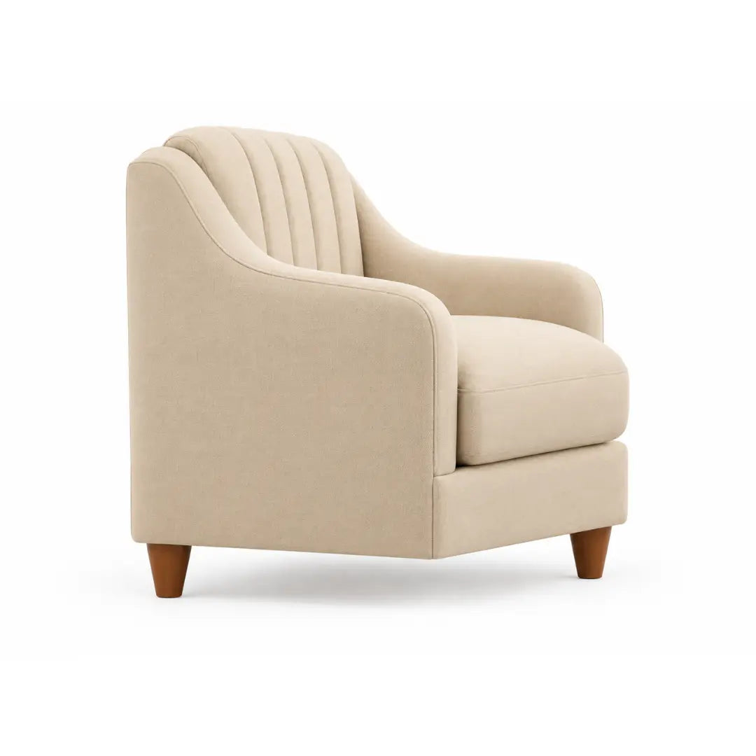 Side view of the Noorvan single seater beige armchair with sloped arm
