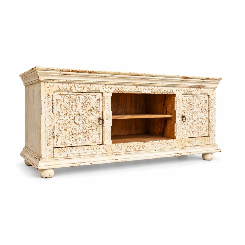 Phoolvan carved white wooden TV unit with floral carved doors, open centre shelf and bun feet