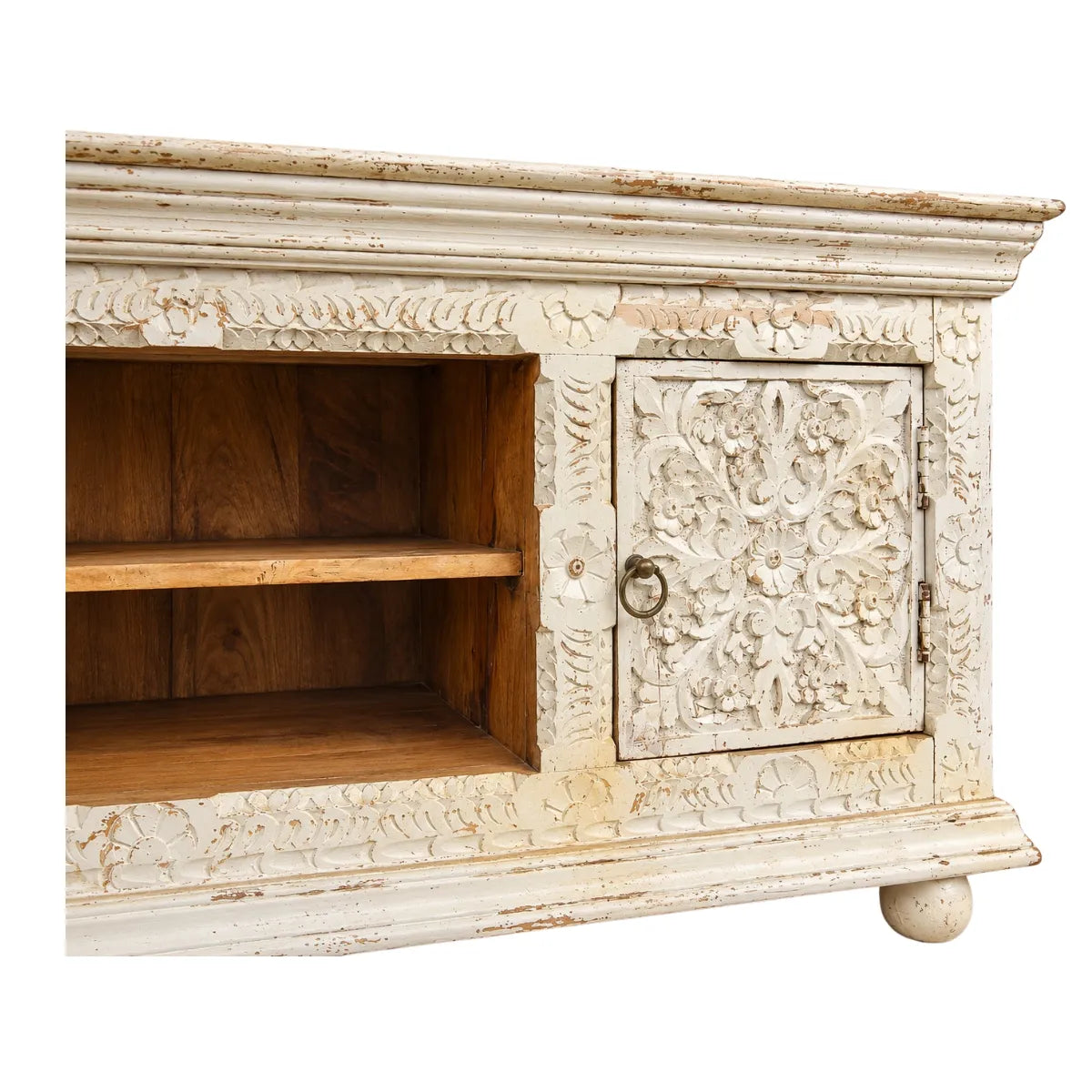 Close-up of Phoolvan TV unit floral carved door, ring pull and natural wood open shelf