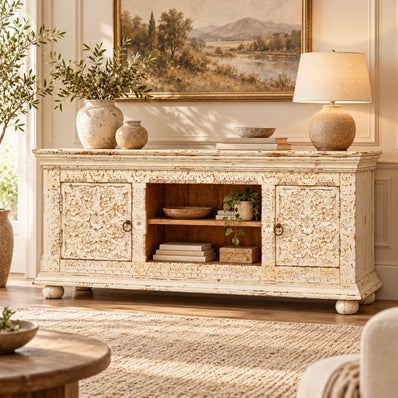 Phoolvan white TV unit in a living room with books and plants on the open centre shelf