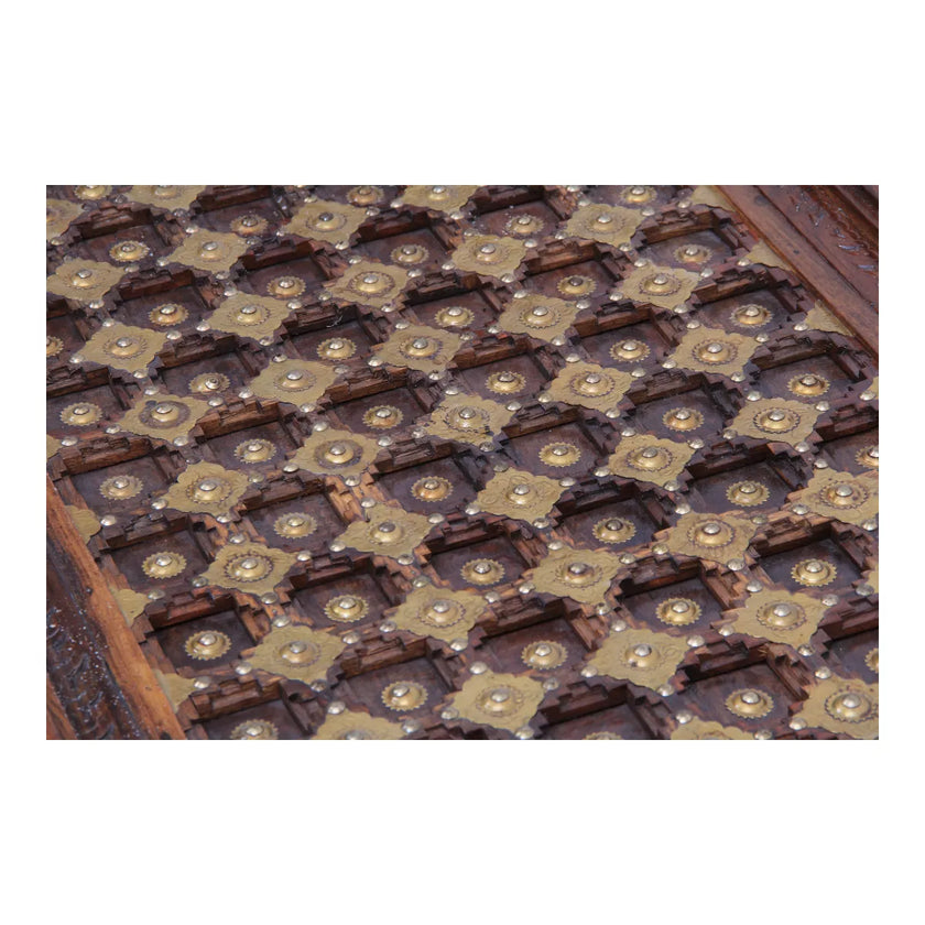 Close-up of hammered brass grid top on Rajasthani vintage center table