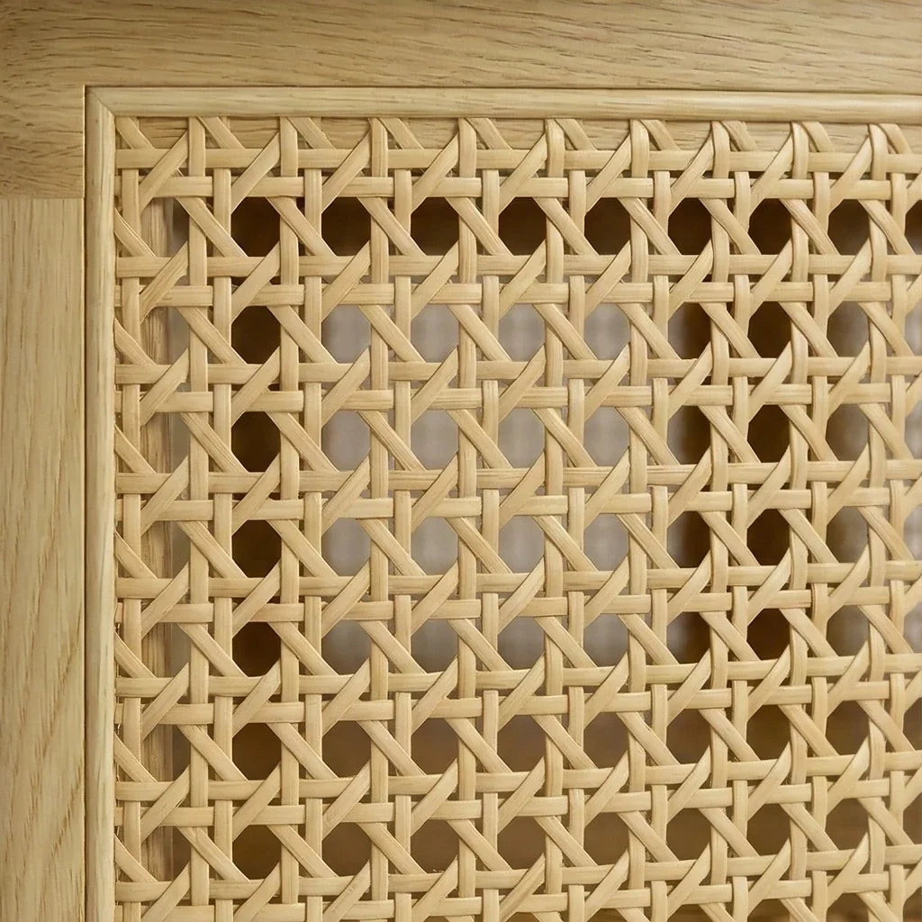Close-up of handwoven rattan cane on round coffee table