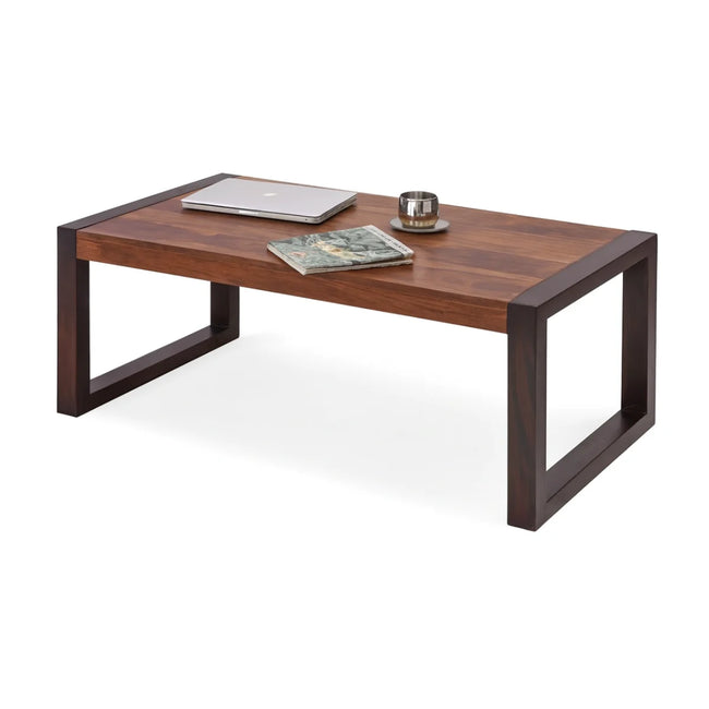 Silvia rectangular two-tone sheesham coffee table with wooden legs styled with decor