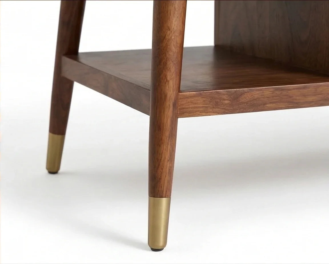 Tapered wooden leg with brass cap detail