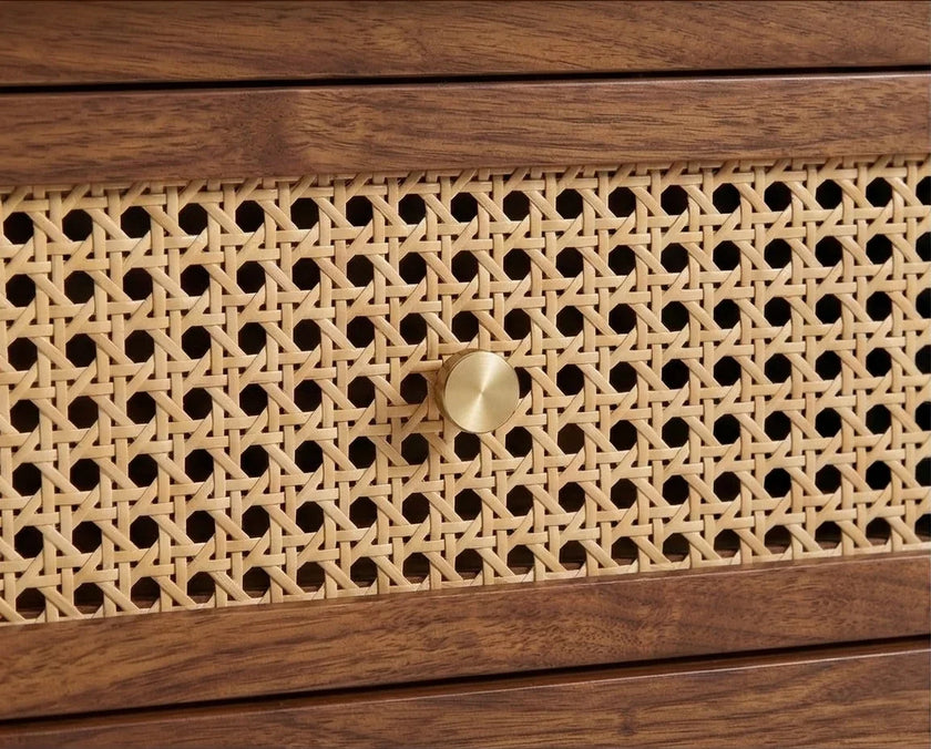 Rattan cane drawer front with brass knob on solid wood coffee table