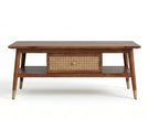 Solid wood coffee table front view with cane drawer and brass leg tips