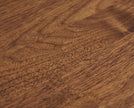 Close-up of solid wood grain on rectangular coffee table top