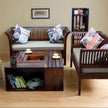 Tesseract square solid sheesham wood storage coffee table with removable tray in a living room