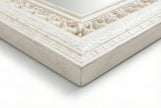 Close-up of the hand-carved detailing on the Vintage White Wooden Wall Mirror frame