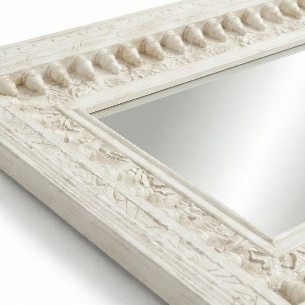 Angled view of the Vintage White Wooden Wall Mirror showing the carved border