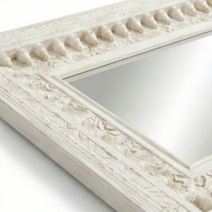 Angled view of the Vintage White Wooden Wall Mirror showing the carved border