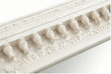 Close-up of the sculpted spindle-style accents on the Vintage White Wooden Wall Mirror